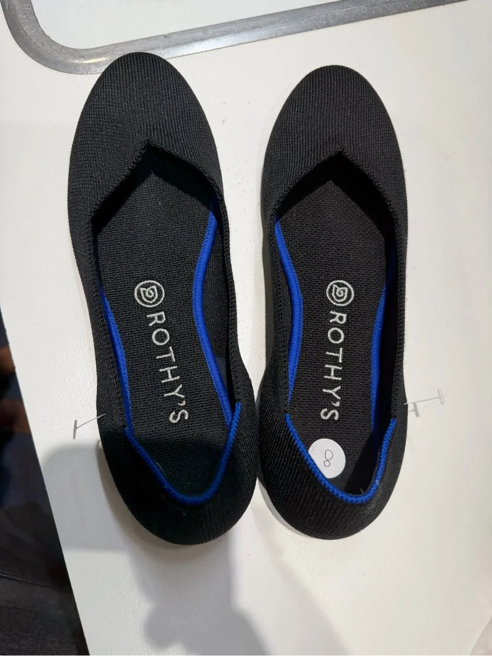 Rothy's Black Knit Flats with Blue Trim
